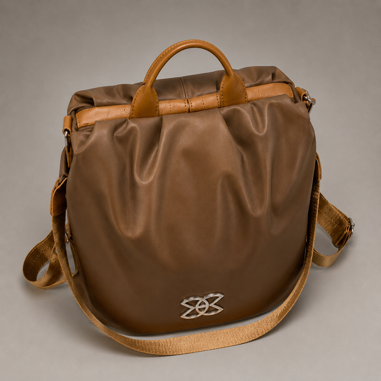 Convertible leather backpack side
