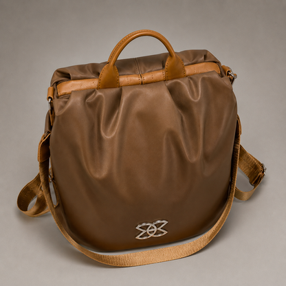 Convertible leather backpack side